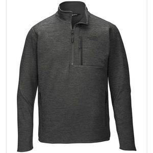Dark grey half zip up fleece sweater.
